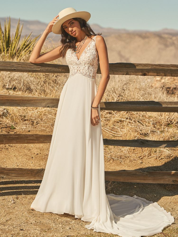 Robe de mariée longue fluide, forme A, jupe avec longue traine, bustier en dentelle, dos nu, manches amovibles